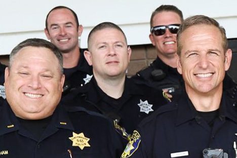 Five Vallejo police officers in a group photograph. From left to right: Lt. Steve Cheatham (ret.), TK, Officer Ryan McMahon, Corporal Dustin Joseph, Corporal Ted Postolaki