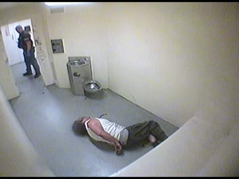 Surveillance video shows then-Detective Kent Tribble repeatedly struck Enrique Cruz, 29, as Cruz sat in a holding cell inside the Vallejo Police Department in 2012. Tribble has since been promoted to lieutenant, and is as a senior member of the department's command staff.