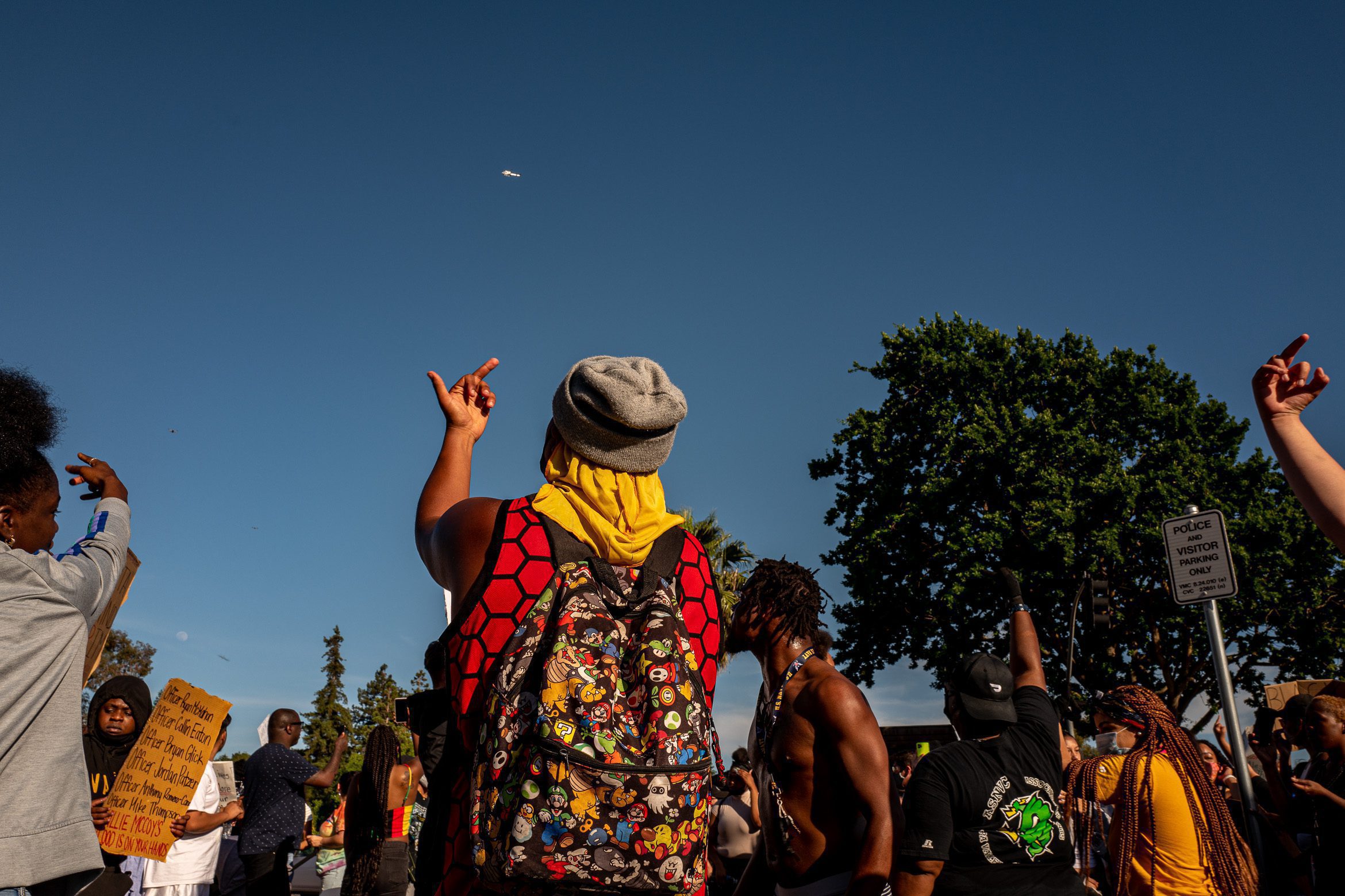 Demonstrators respond to the presence of two drones and a police helicopter on June 2, 2020, hours after Vallejo Police Det. Jarrett Tonn killed Sean Monterrosa, an unarmed 22-year-old, in a Walgreens parking lot.