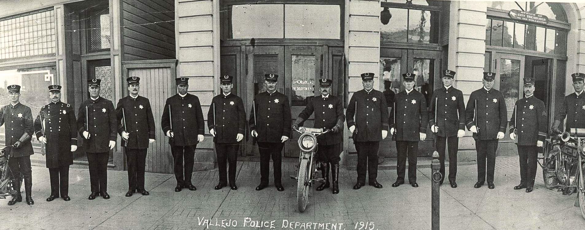 Members of the Vallejo Police Department stand in front of their headquarters in a photograph dated 1915.