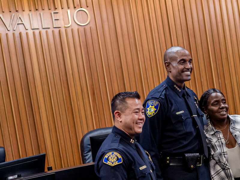 Then-San Jose Police Department Capt. Jason Ta, left, poses in the Vallejo City Council chambers for a photograph with Vallejo Police Chief Shawny Williams minutes after Williams was sworn in as Vallejo's police chief on Nov. 12, 2019. In 2021, Williams recruited Ta to serve as his deputy chief of police.