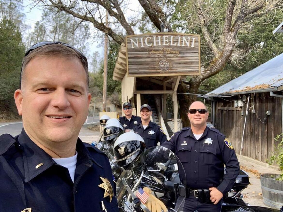 Vallejo Police Lt. Michael Nichelini takes a selfie with colleagues in front of his family’s winery in St. Helena, Calif. during a “training ride” on Nov. 14, 2019.