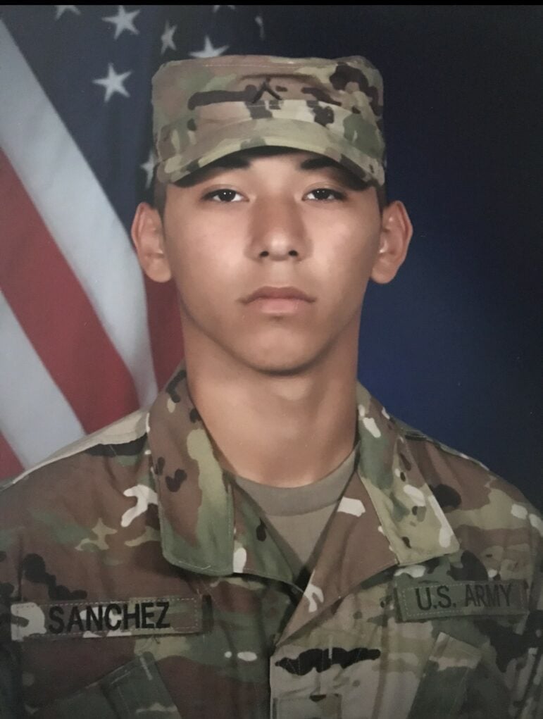 An official portrait of a young man in a U.S. Army uniform