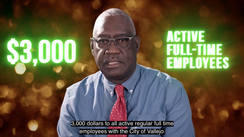 Vallejo City Manager Michael Malone speaks in a video with the text, "$3,000" and "active full-time employees" on either side of his head.