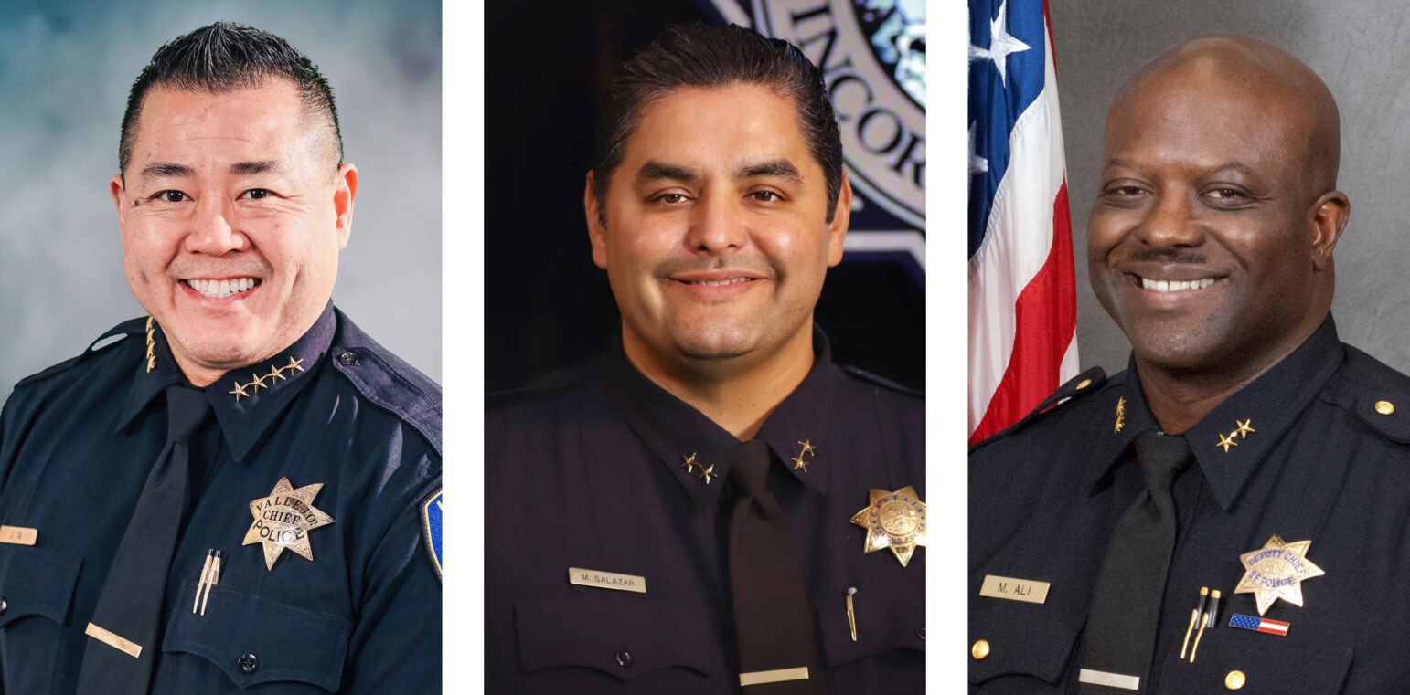 A triptych of headshots shows three police leaders, all in uniform. On the left is Vallejo Interim Police Chief Jason Ta, in the center is Fresno Deputy Police Chief Mark Salazar, and on the right is San Francisco Deputy Police Chief Mikail Ali. Each officer smiles while wearing a uniform, tie, and metal badge.